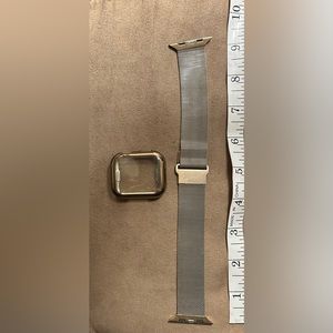 Gold colored Apple Watch compatible watch band and case.